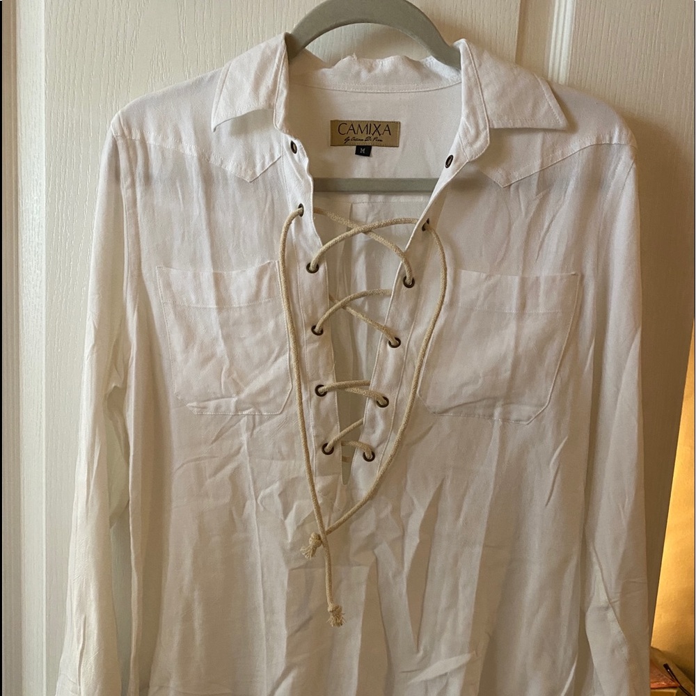 Cool tie up shirt. Never worn.